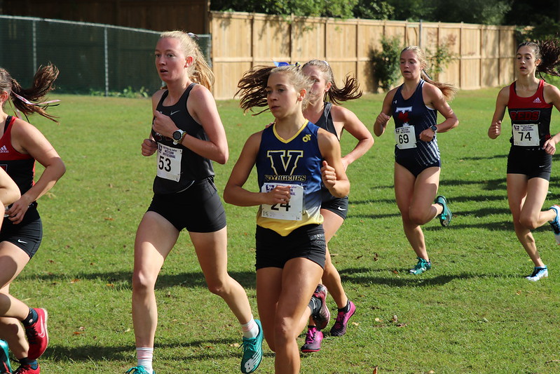 Pascale running among other competitors during a race