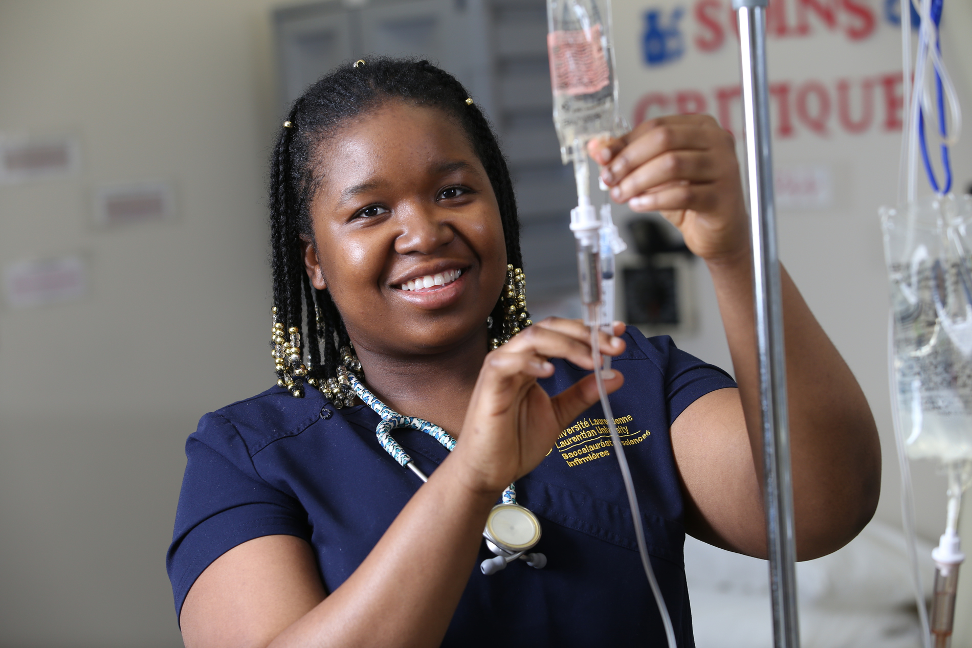 Student holding IV