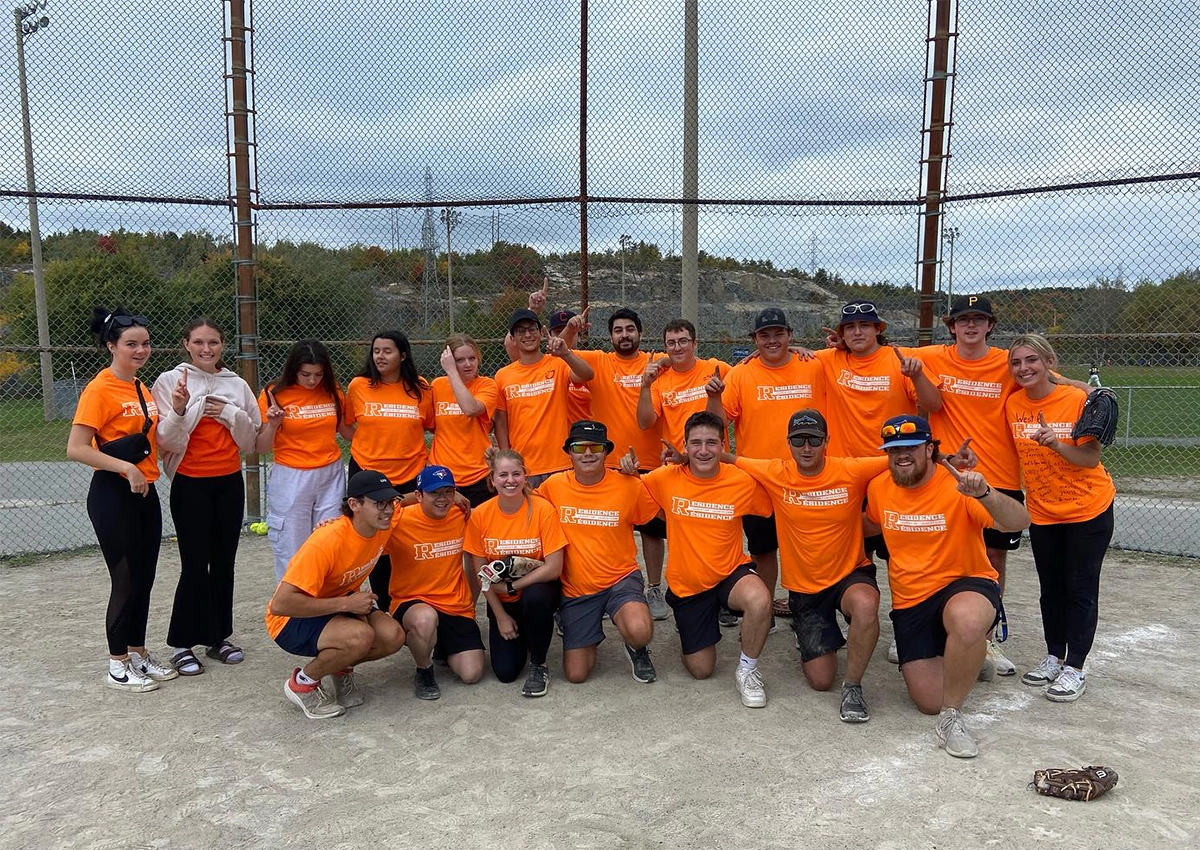 Laurentian University students posing for the Residence Baseball Tournament.