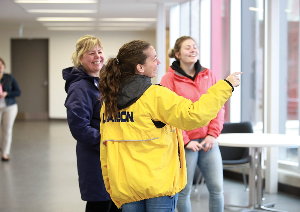 A Laurentian University tour guide giving a campus tour.