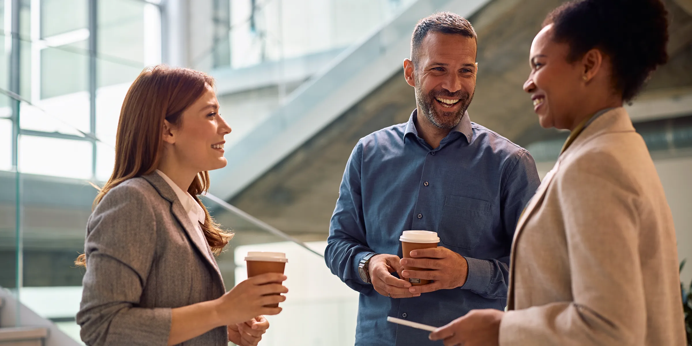 Group of people drinking coffee and socializing