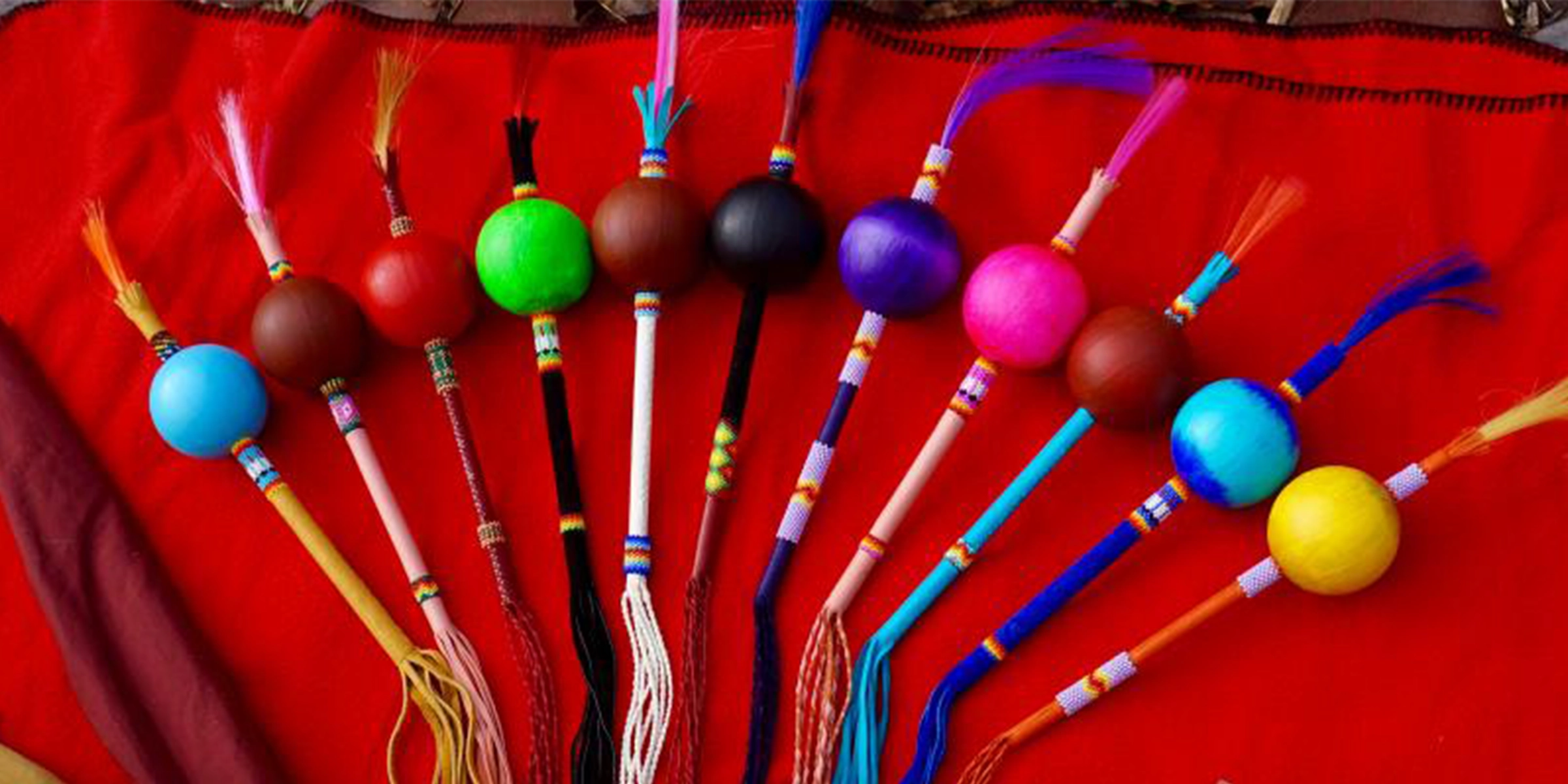 indigenous decor is laid out on a handcrafted blanket