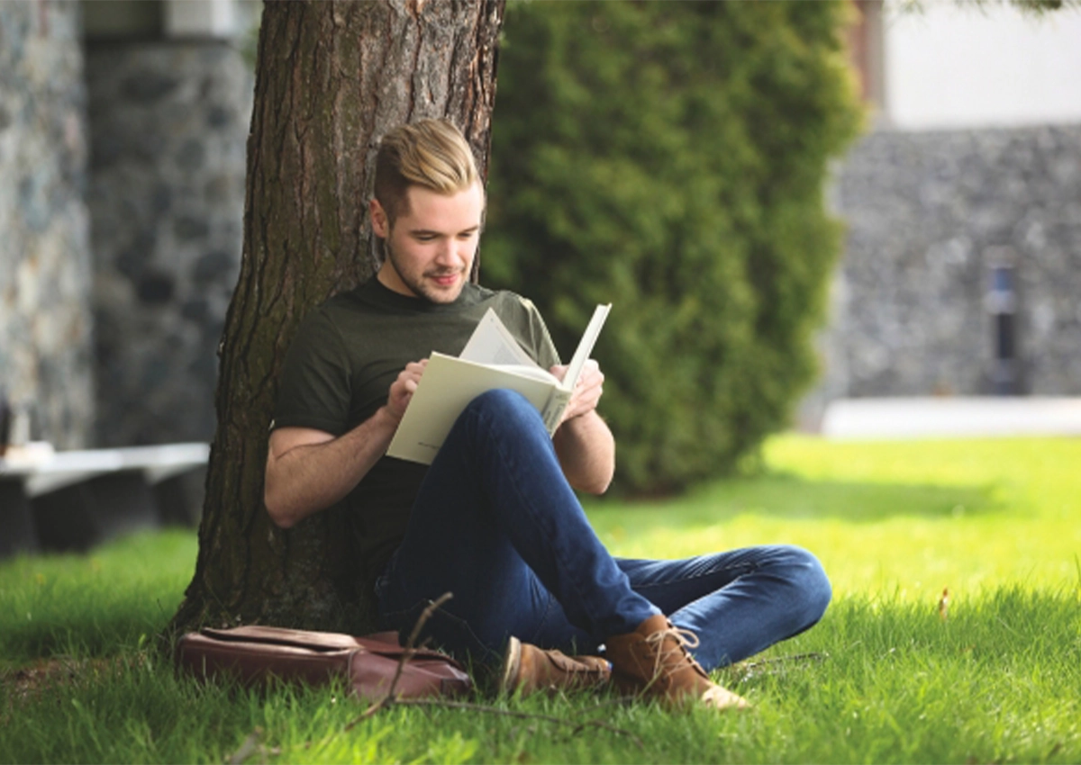 Student Studying Outside On-Campus