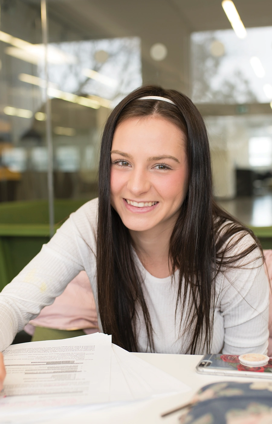 A Laurentian University student studying in a study room in the R.D. Parker building.