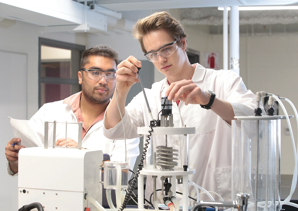 Two Laurentian University students working in a science laboratory.