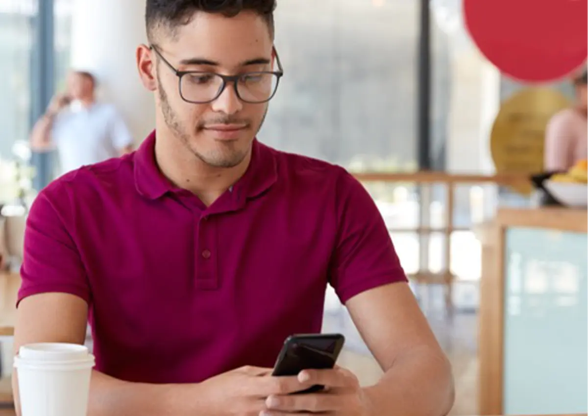 Man playing on his phone