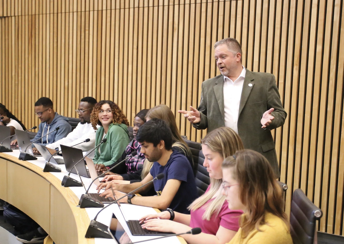 A professor teaches a lecture to students in the Executive Learning Centre.