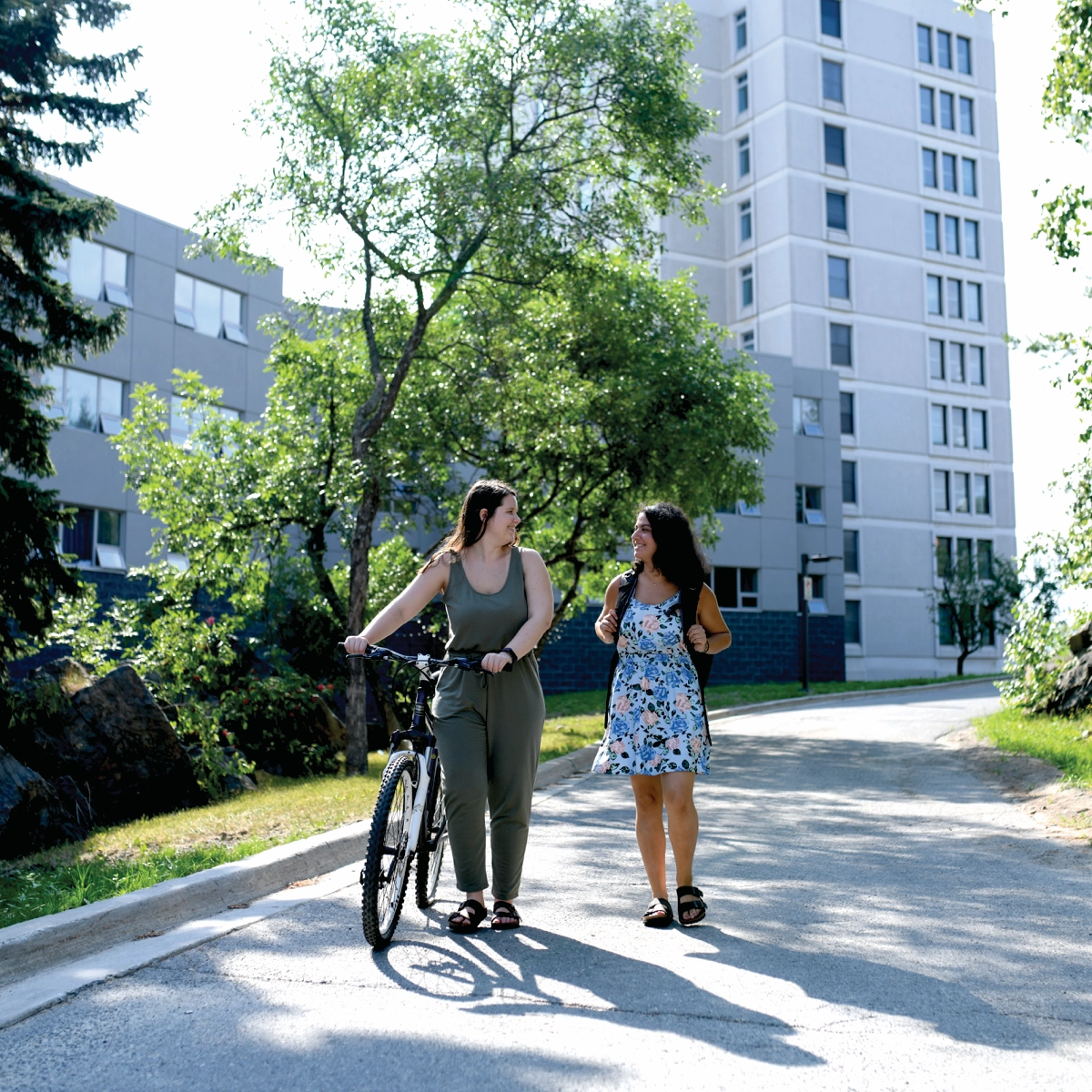 Laurentian University students walking on campus.
