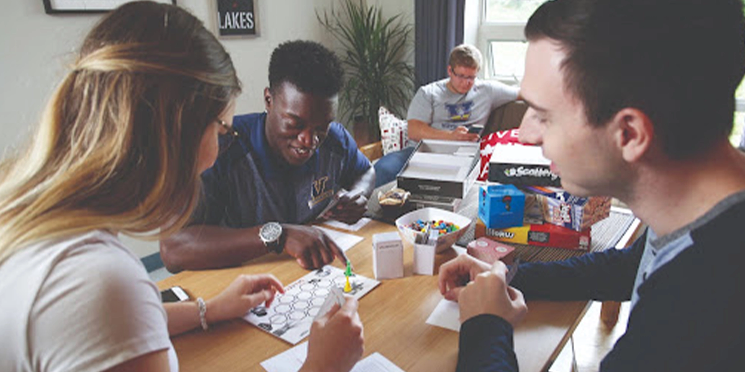 Group of friends playing a board game