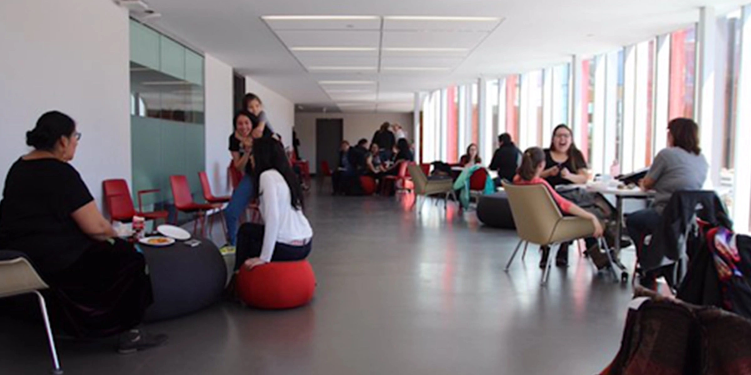 Students sitting on beanbags talking