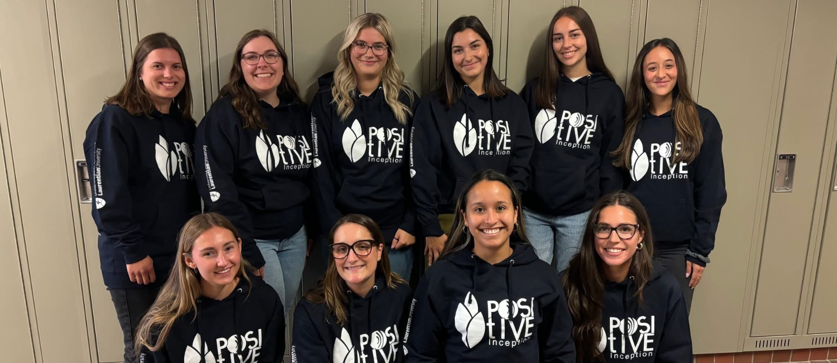 Ten students from Laurentian University’s 2024–2026 master’s cohort in Orthophonie pose in matching navy hoodies during their first course in September 2024. Back row, from left to right: Amber Flannigan, Chloé Bureau, Ashley Benoît, Isabelle Lancup, Chloé Léger, and Vanessa Di Lullo. Front row, from left to right: Caitlyne Kervin, Maria Falconi, Paula Castillo, and Gabrielle Héroux.