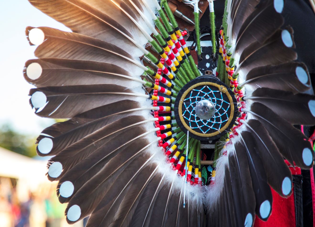 Colourful eagle feather regalia