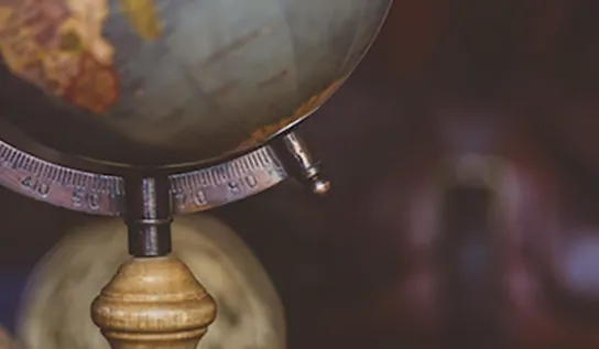  a globe on a desk