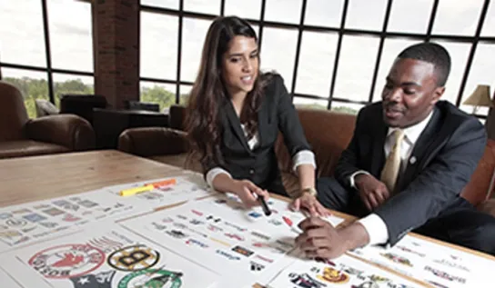 Two students working on a project together.