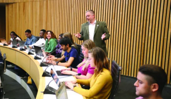 A Laurentian University professor teaching a class.