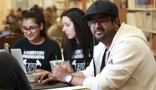 Students sitting around a table