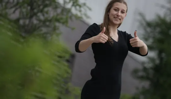 Student with thumbs up