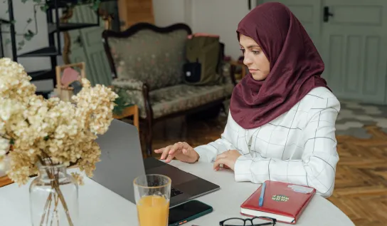 A student using her laptop